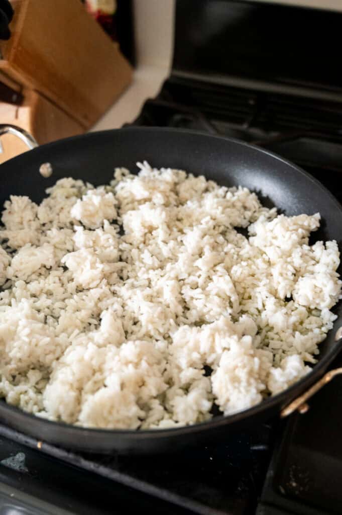 crisped white rice in a pan.