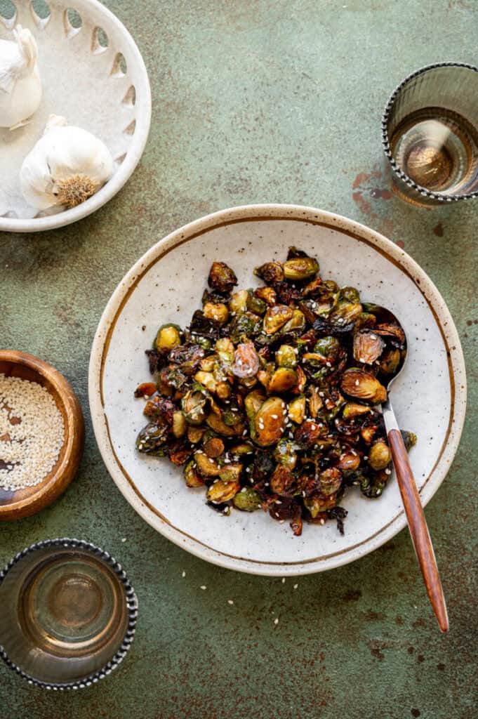 spicy roasted brussels sprouts in a bowl.