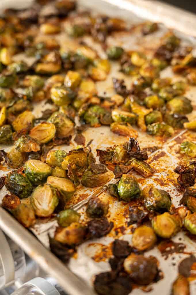 roasted brussels sprouts on a baking tray.