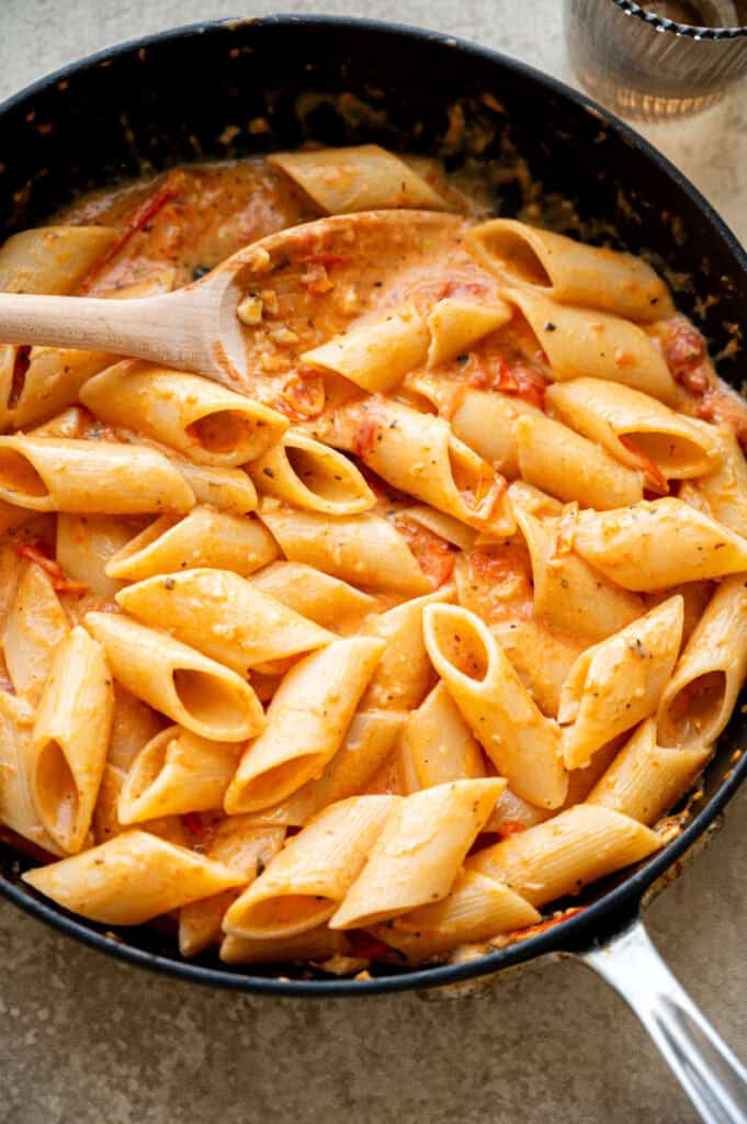 tomato penne pasta in a pan.