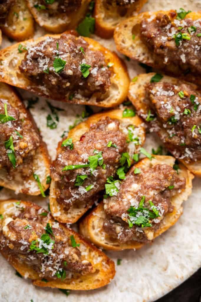 close up shot of sausage bruschetta.