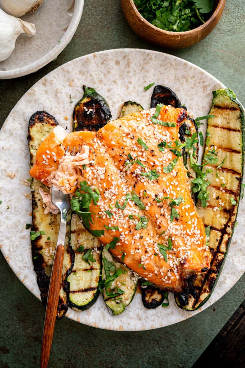 sesame salmon with grilled zucchini.