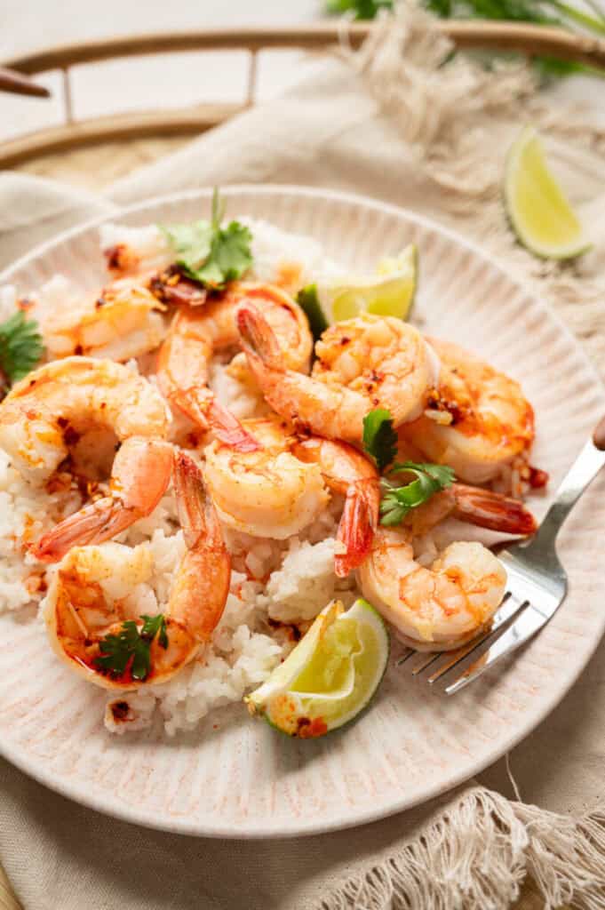 close up shot of shrimp and coconut rice.