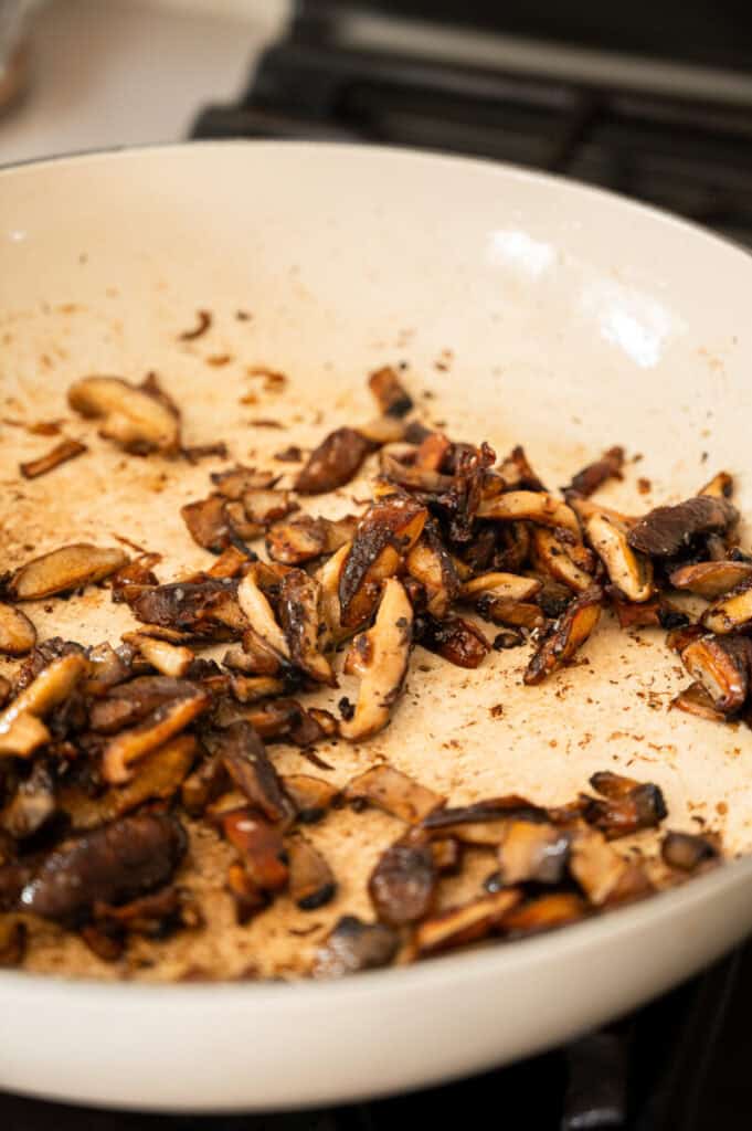browned mushrooms in a pan.
