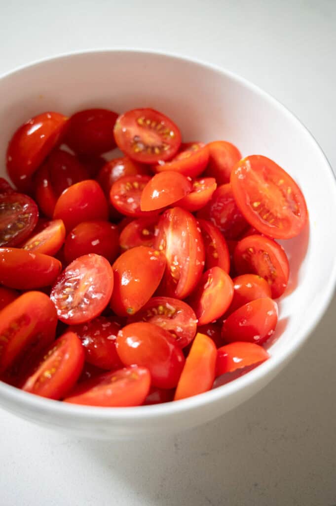 salted cherry tomatoes in a bowl.