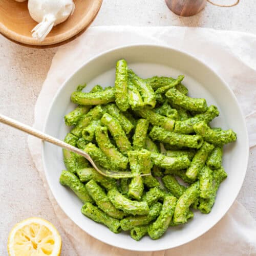 green goddess pasta in a bowl with a fork.