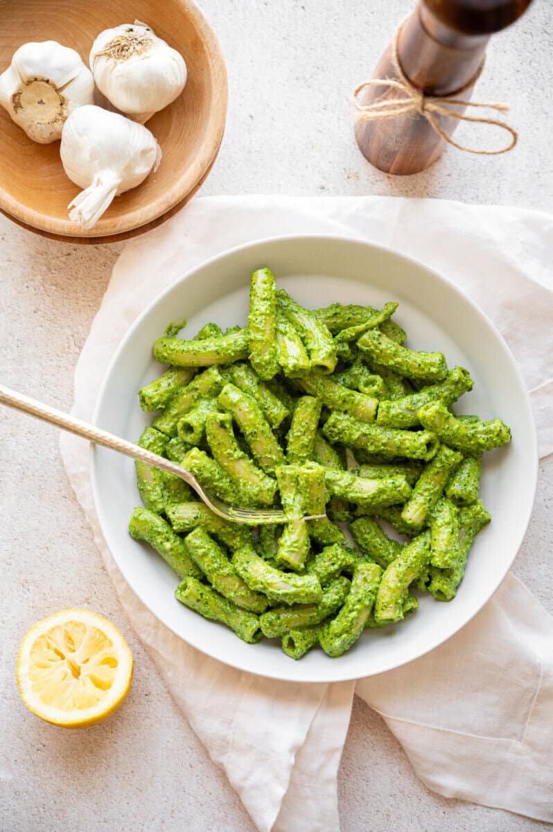 green goddess pasta in a bowl with a fork.