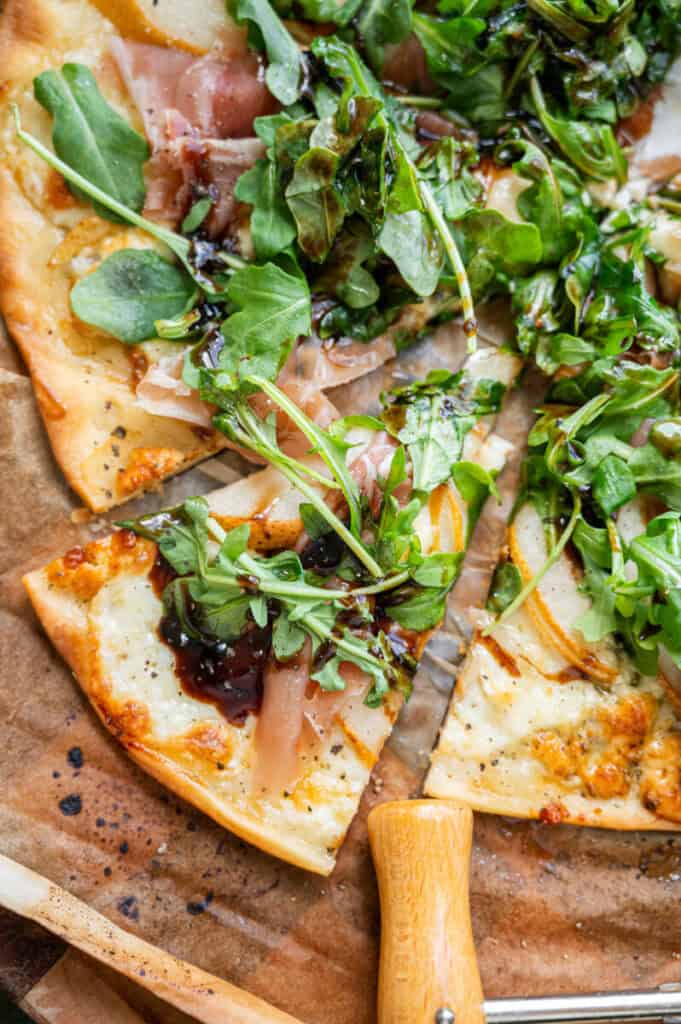 pear, prosciutto, and gorgonzola pizza close up.