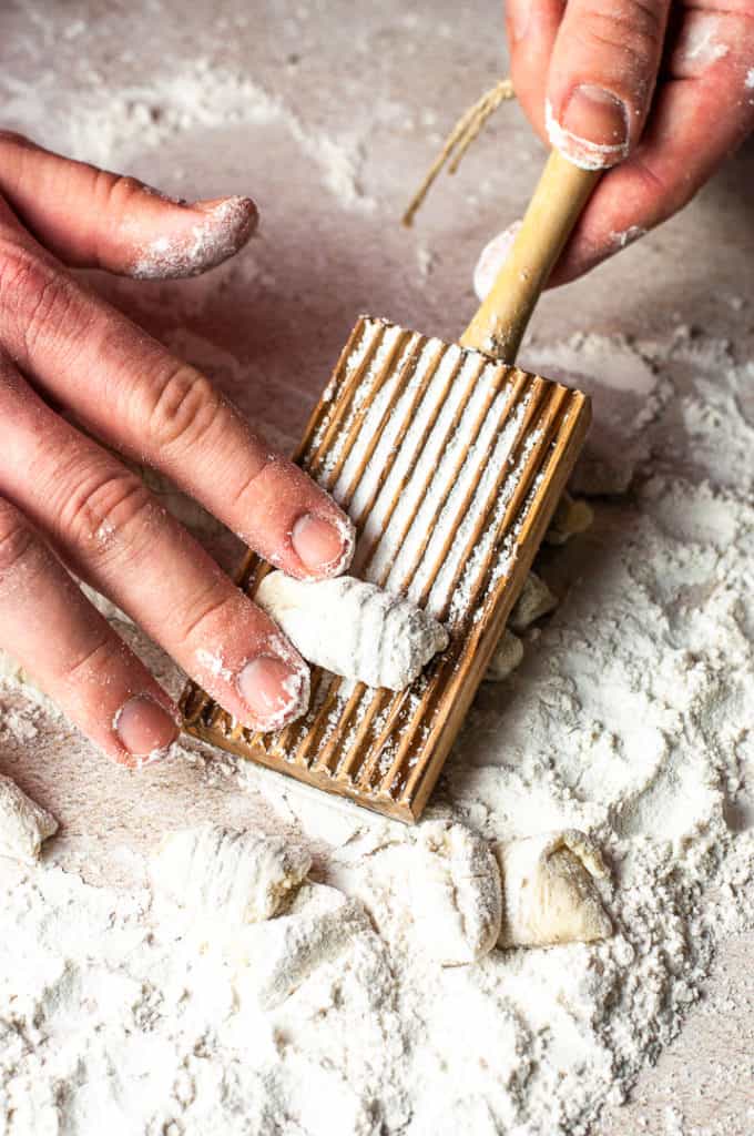 hand rolling homemade gnocchi