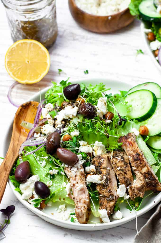 Greek chicken salad with crispy chickpeas in a bowl