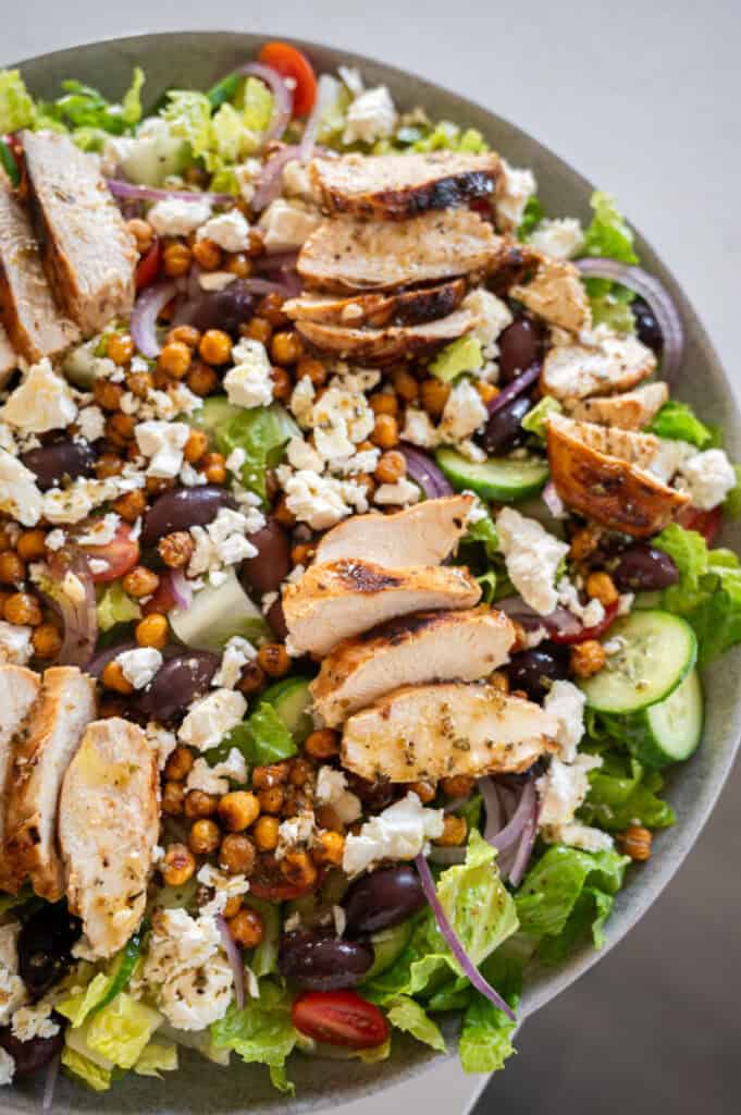 greek chicken salad in a bowl.