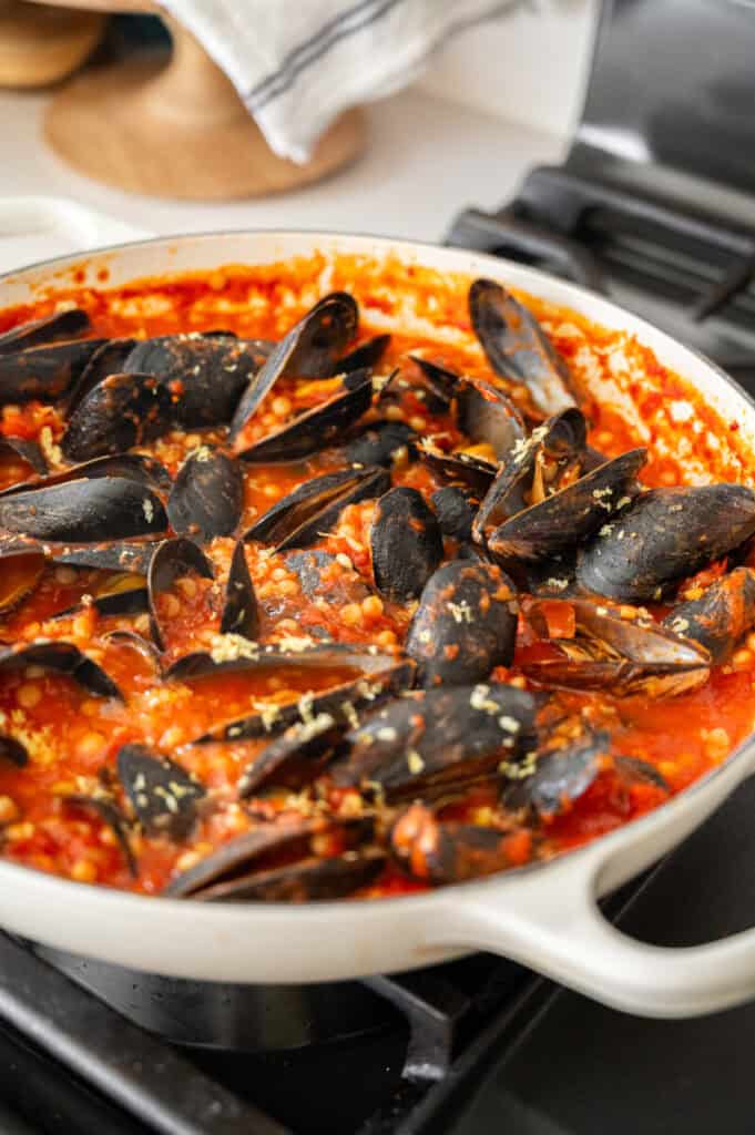 steamed mussels in tomato broth.