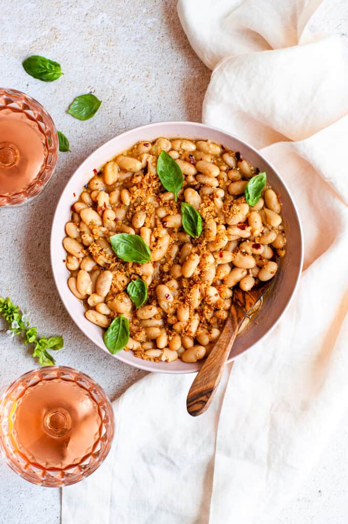 Cannellini beans in a bowl with wine 