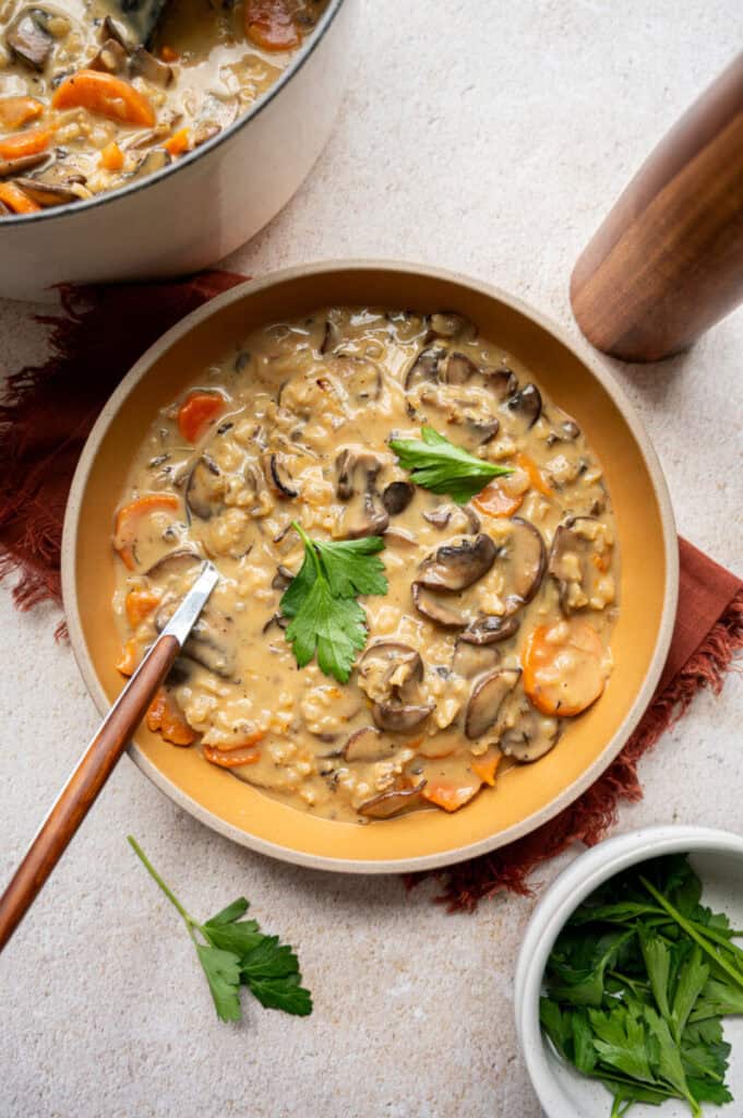creamy wild rice and mushroom soup in a bowl.