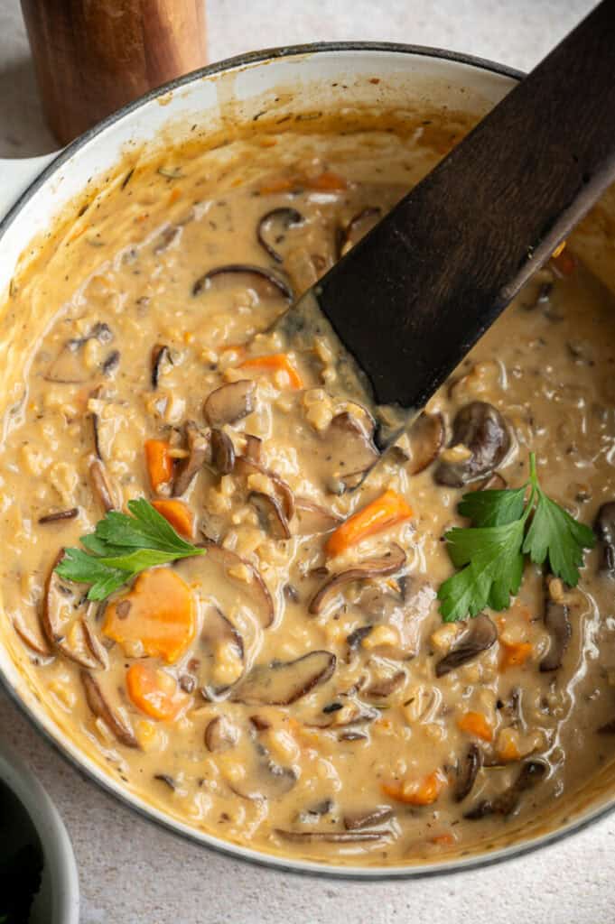 wild rice mushroom soup in a pot.