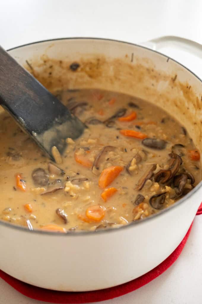 wild rice mushroom soup in a pot.