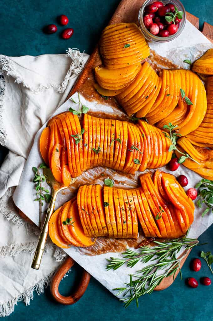 Hasselback Butternut Squash on a Serving tray with a napkin
