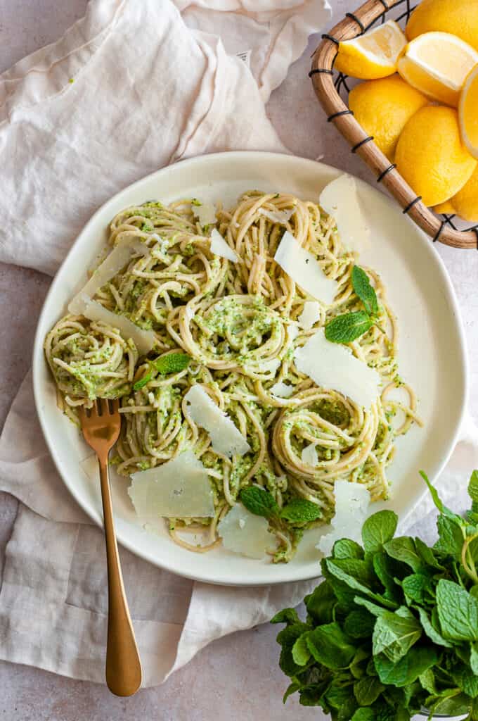 pesto di zucchini on a plate with a fork