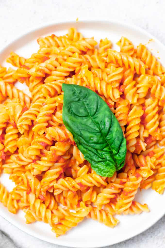 Pasta with red sauce and basil