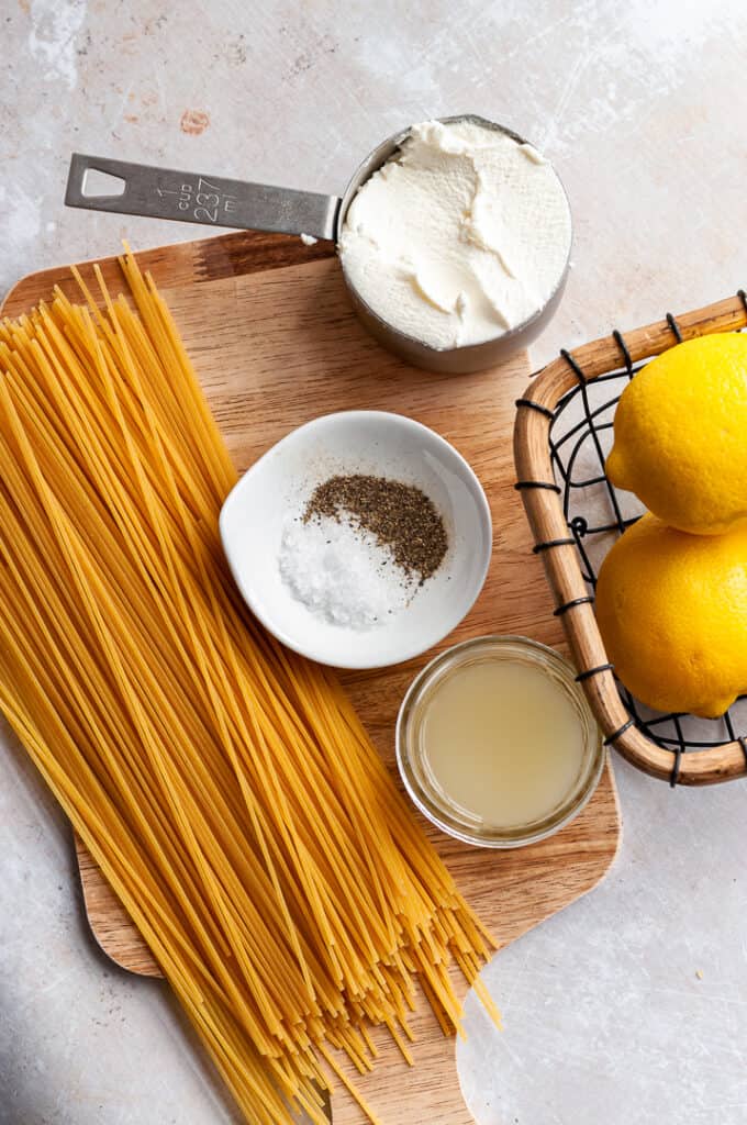 ricotta, pasta, lemon juice on a board