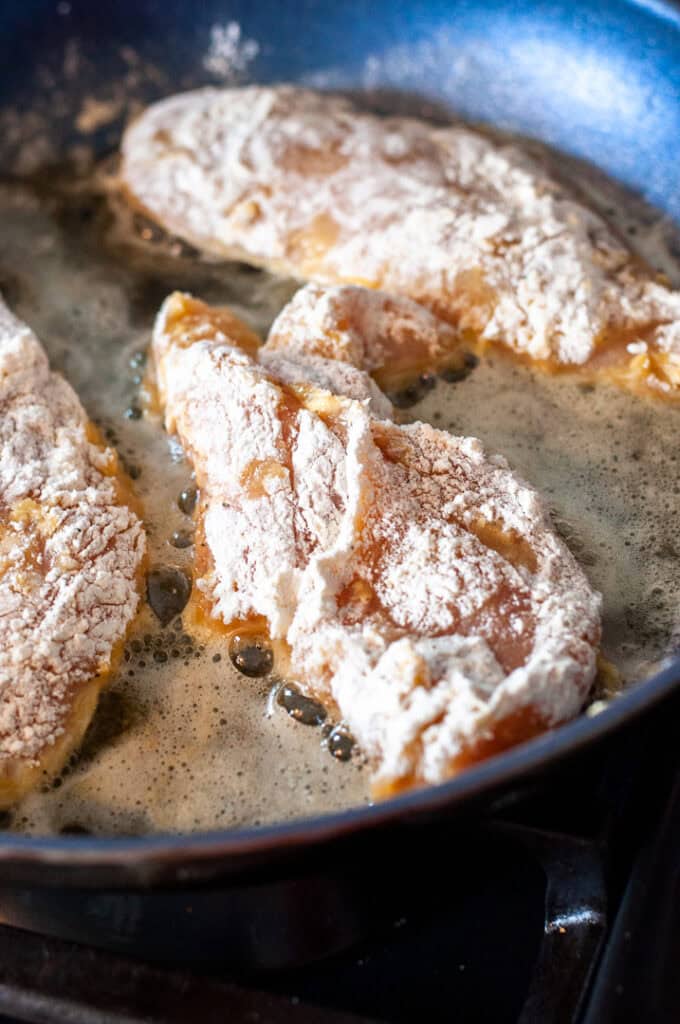 chicken cooking in butter.