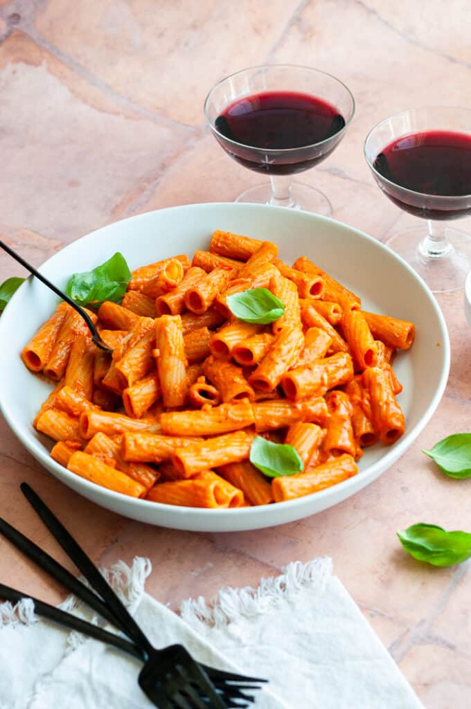 Spicy Rigatoni in a bowl with basil