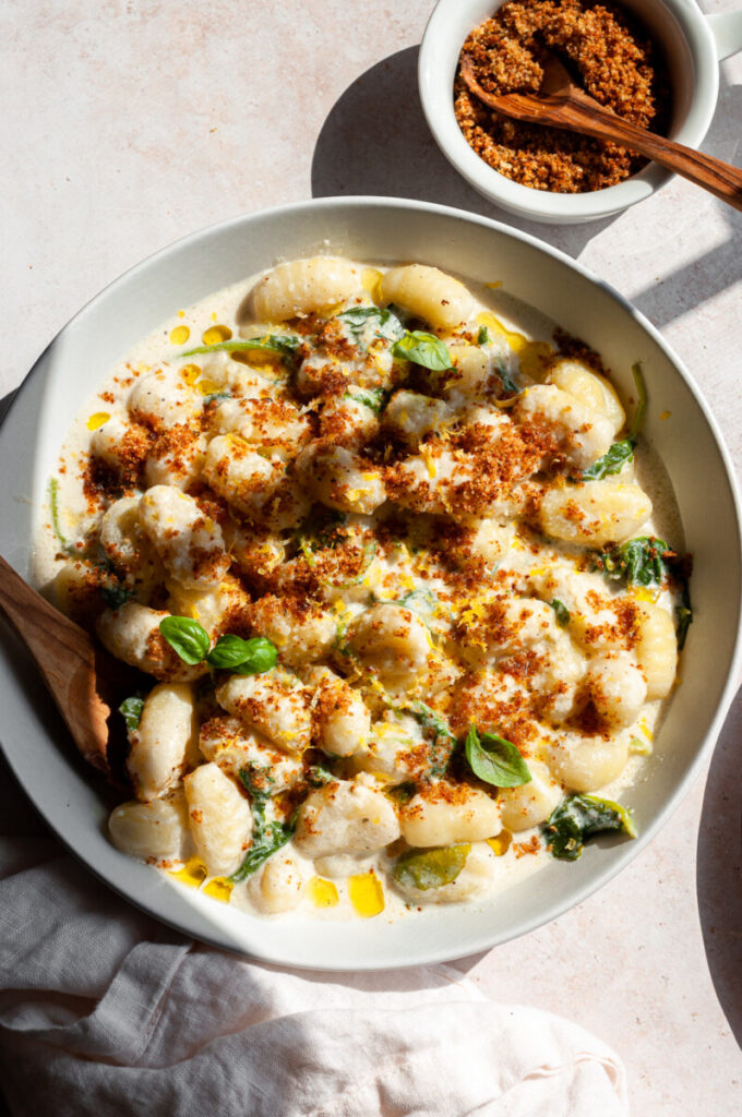 gnocchi with breadcrumbs and lemon zest in a bowl
