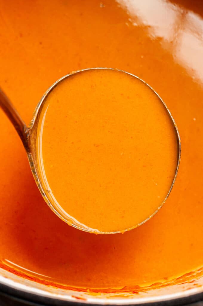 tomato soup in ladle