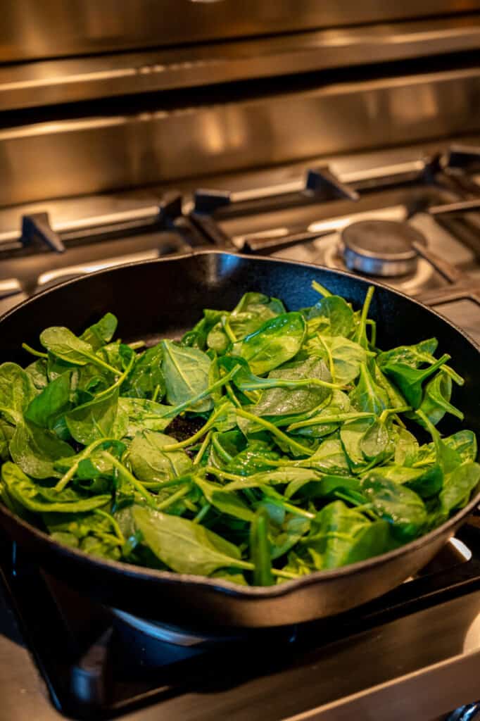 spinach cooking in a pan