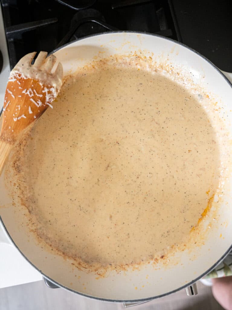alfredo sauce in a pan.