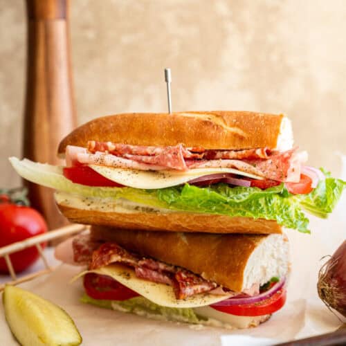 Italian BMT sandwiches stacked on top of each other