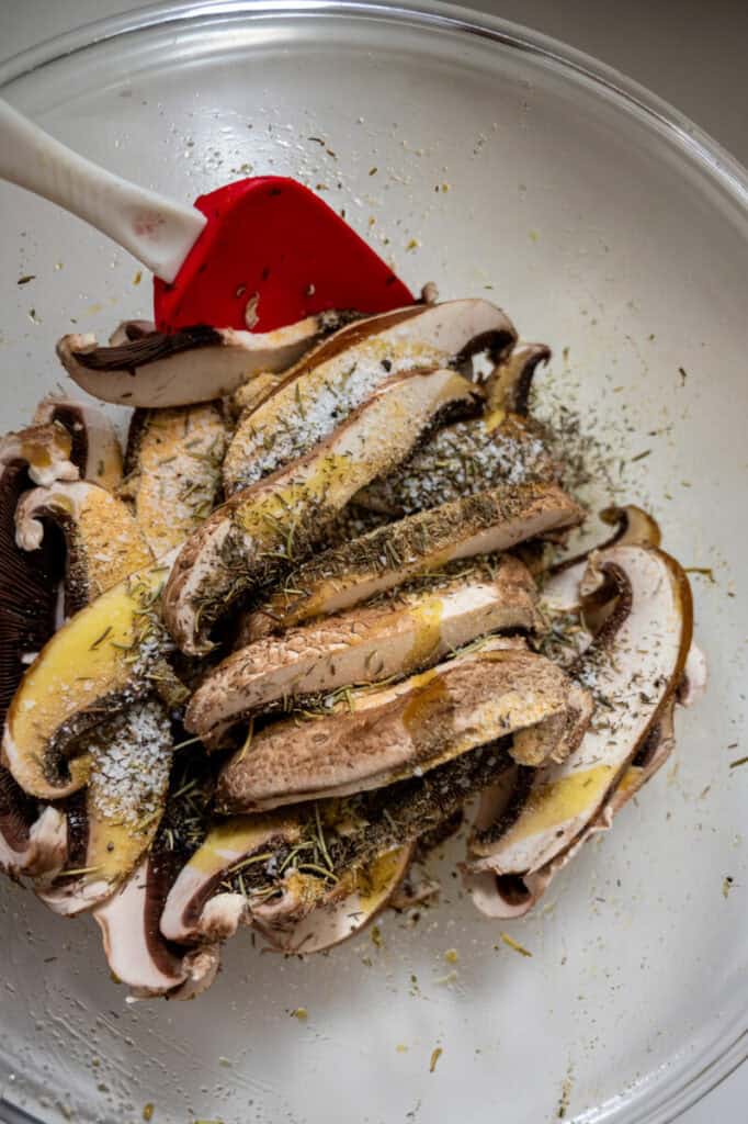 seasoned portobello mushrooms in a bowl.