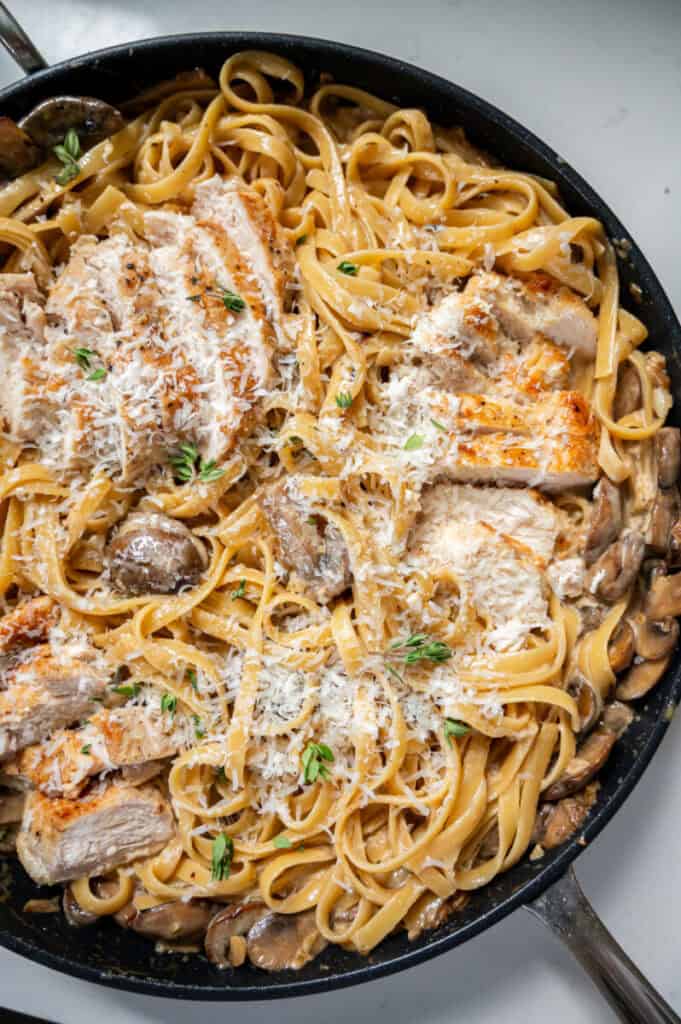 fettuccine Alfredo with chicken and mushrooms.