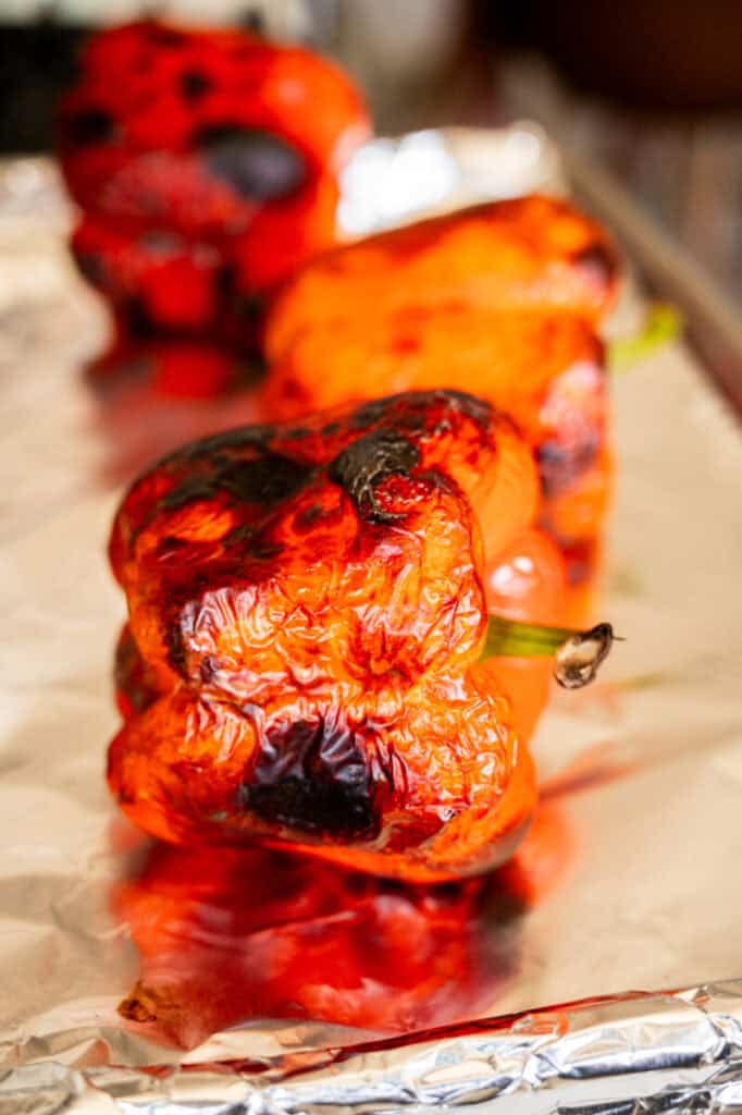 roasted red peppers on a tray.