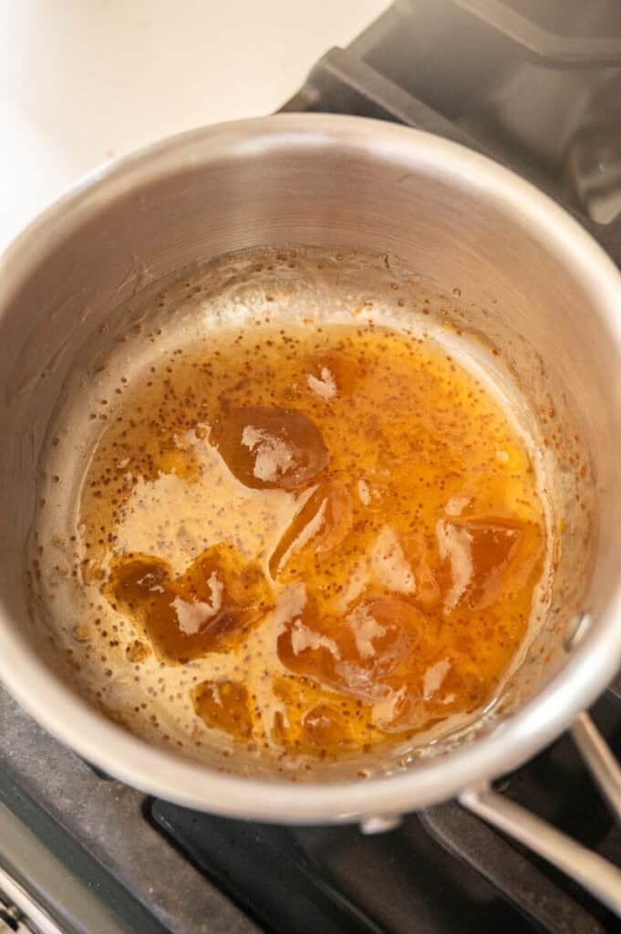fig jam and honey in a saucepan.