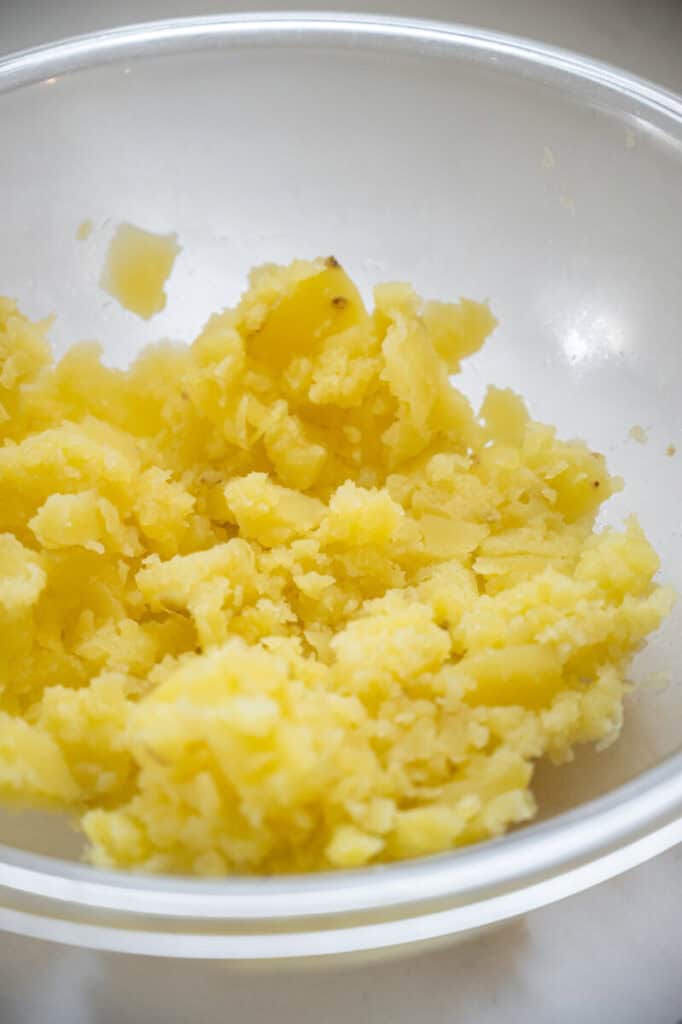 mashed golden potatoes in a bowl.