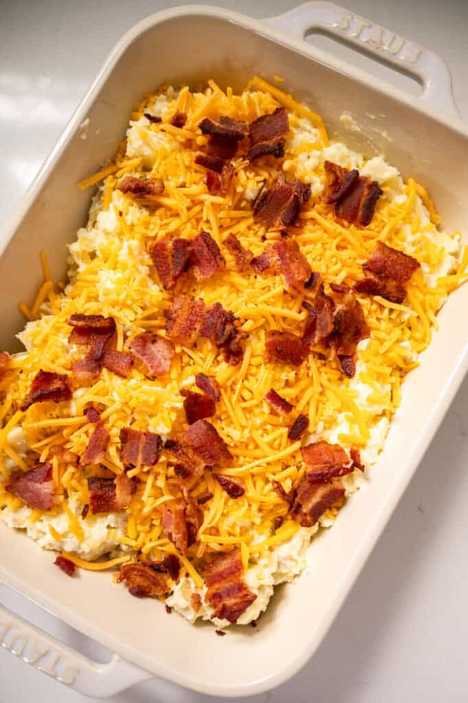 twice baked mashed potatoes in a dish.