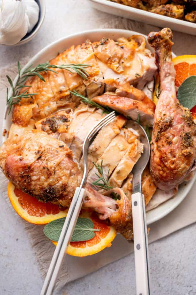 roasted turkey cut on a plate.