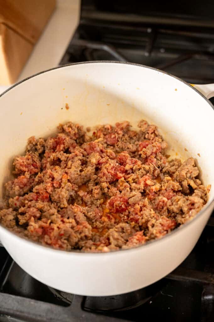 seared sausage in a pot.