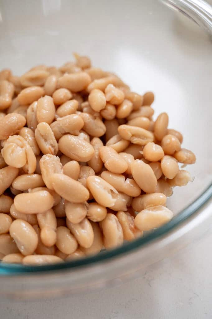 drained cannellini beans in a bowl.