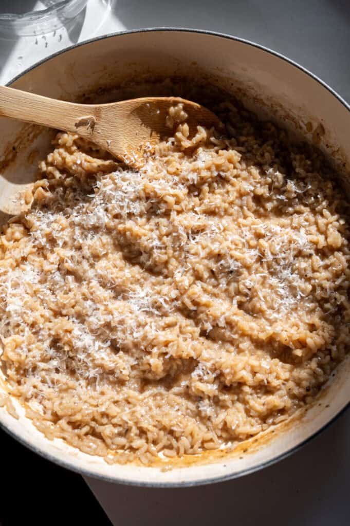 risotto topped with cheese.