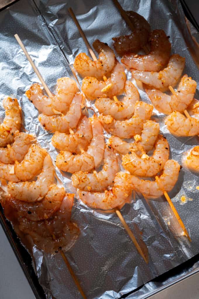 Shrimp skewers on a tray.