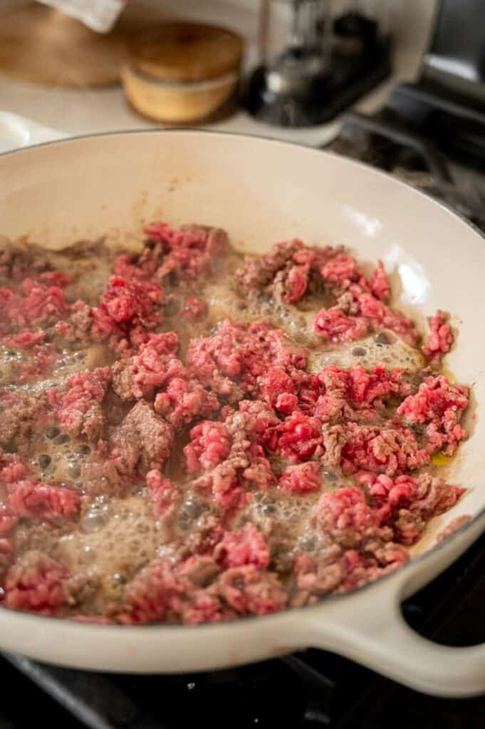 beef browning in a skillet.