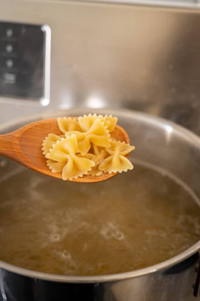 farfalle cooking in a pot.