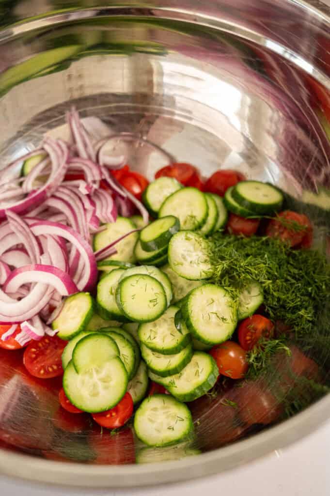 veggies in cucumber tomato pasta salad.