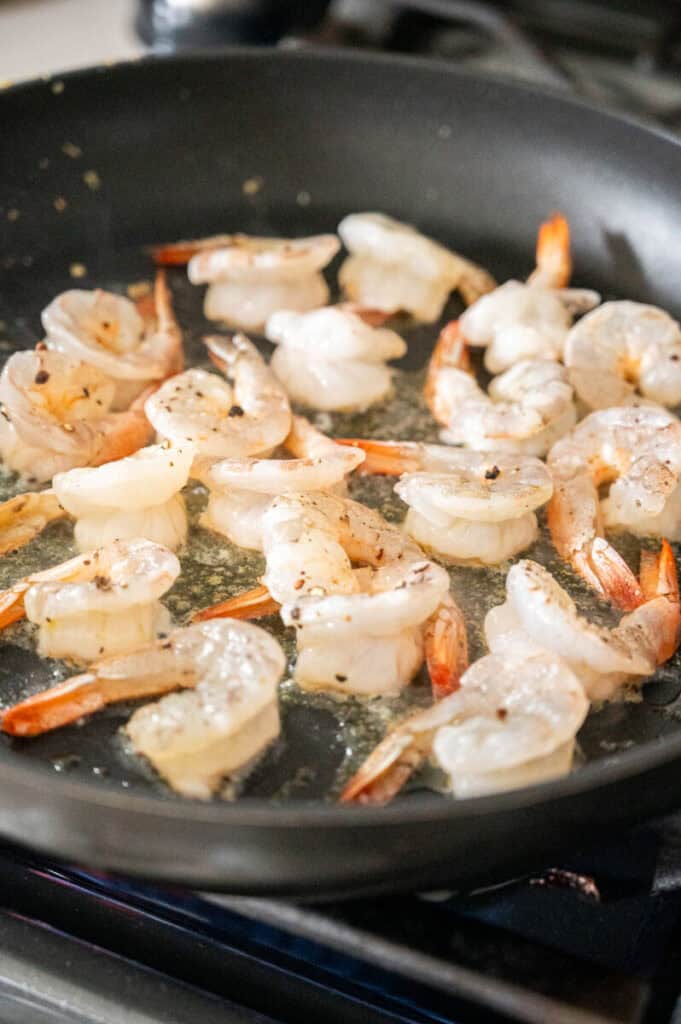 shrimp cooking in a pan.
