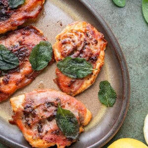 chicken saltimbocca on a plate.