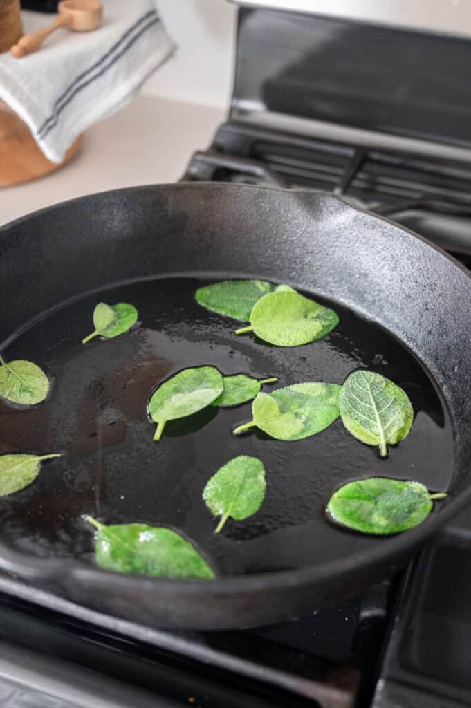 sage frying in a pan.