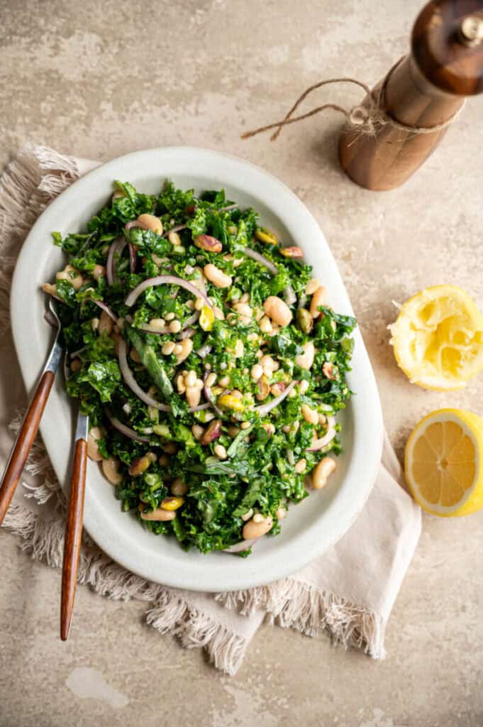 kale and cannellini bean salad on a plate.
