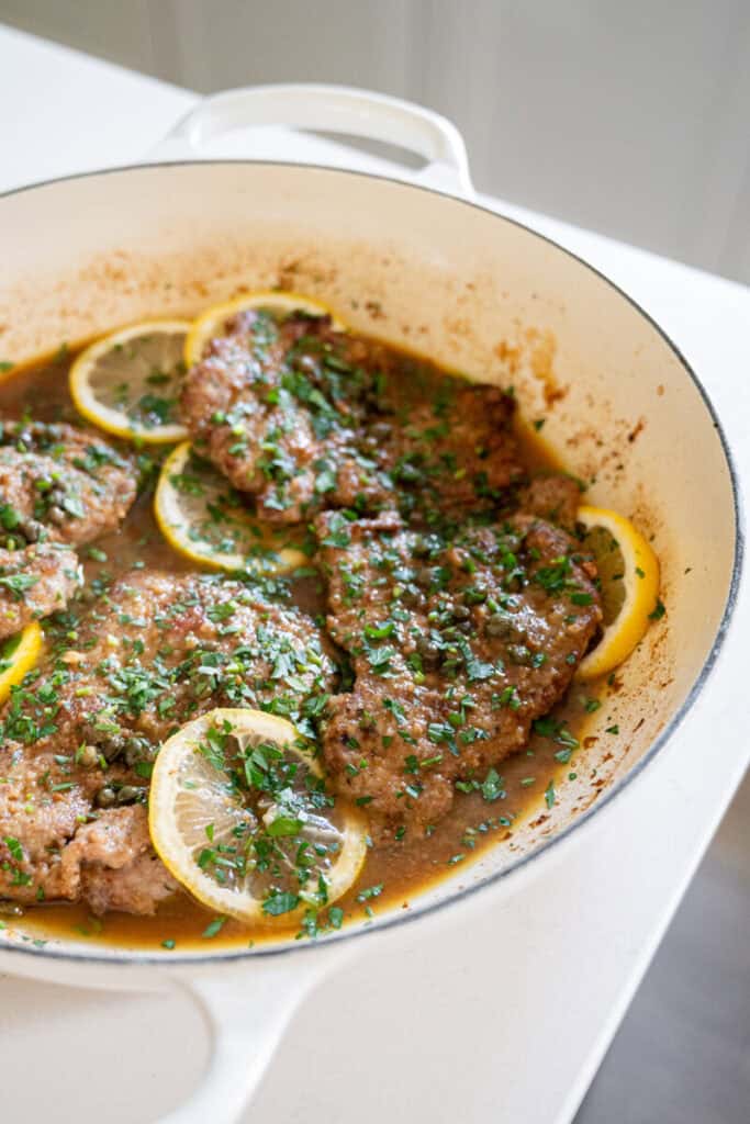 veal piccata in a skillet.